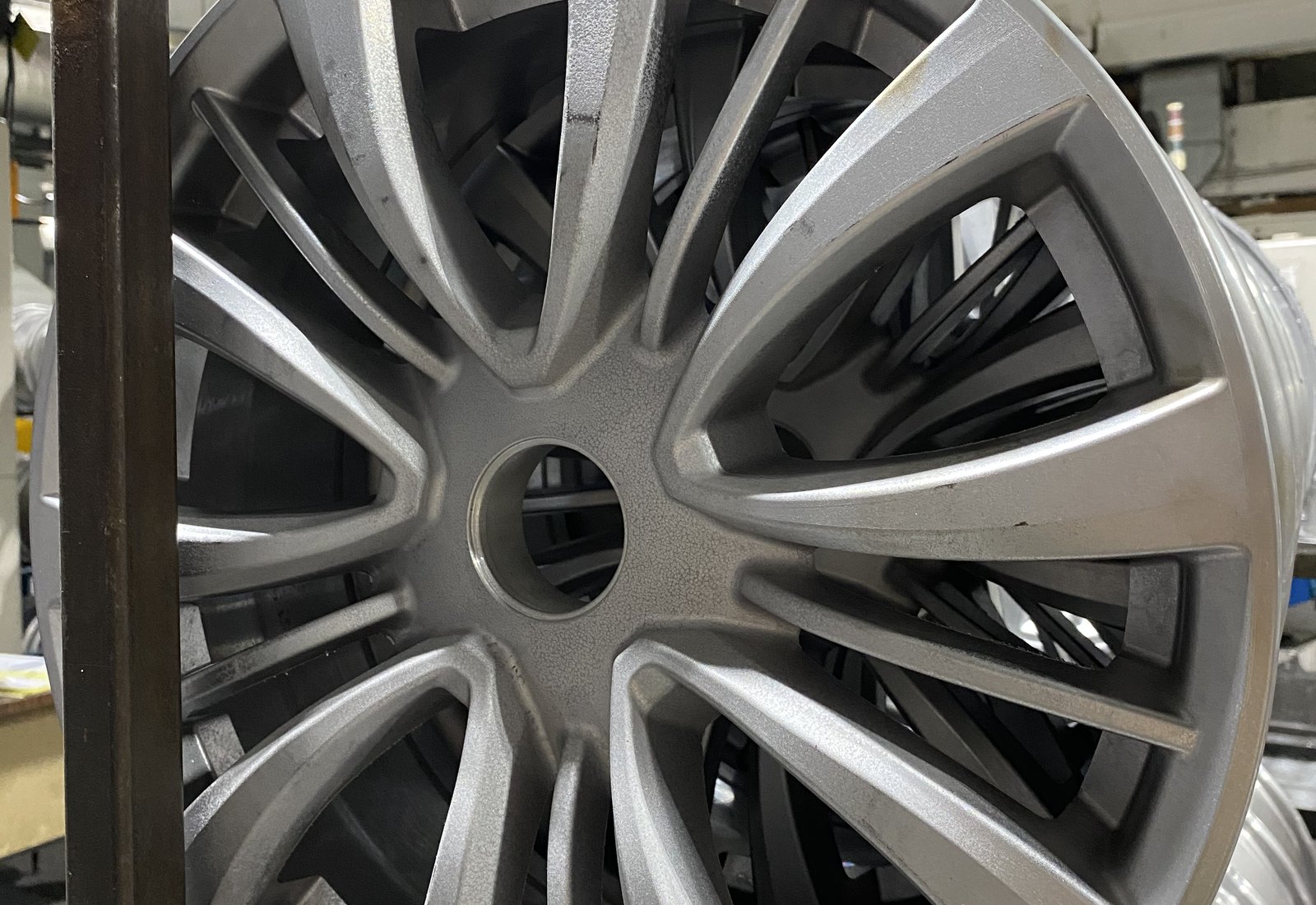 Wheel surface and spoke geometry close-up used as a mobility surface quality reference